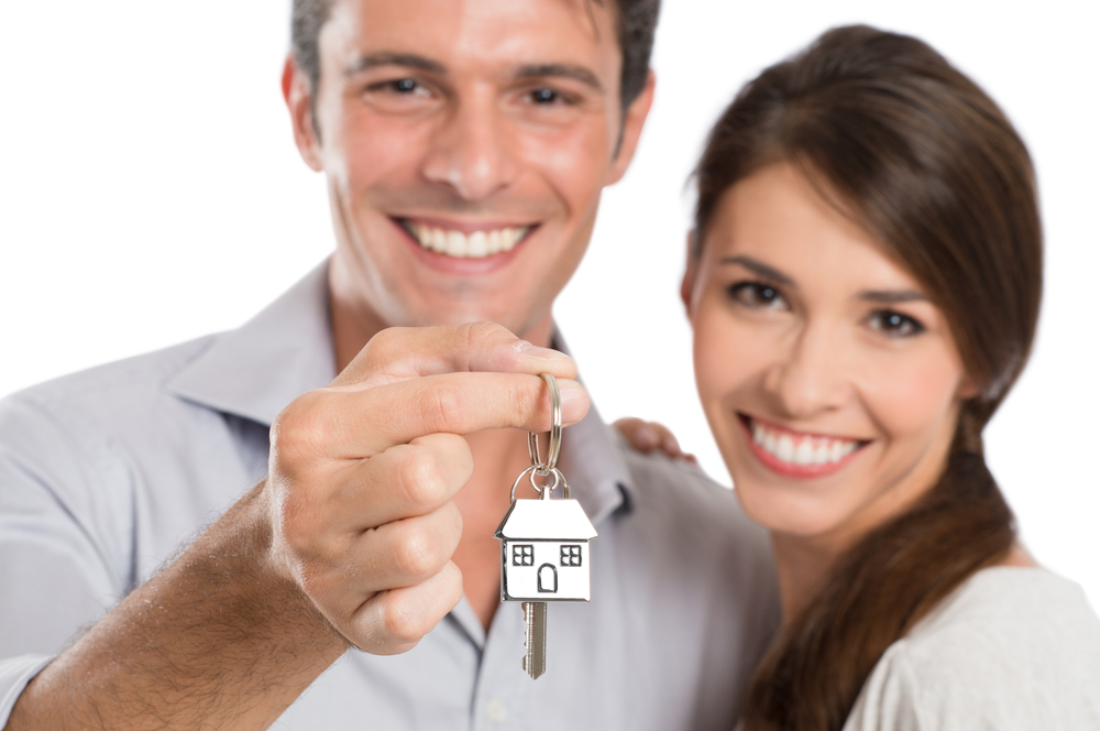 Young couple holding house keys