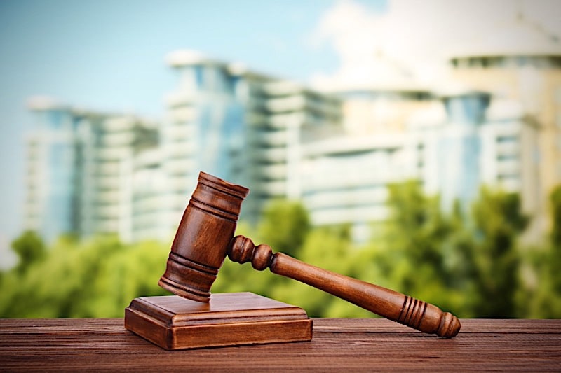 how do you buy a house from auction