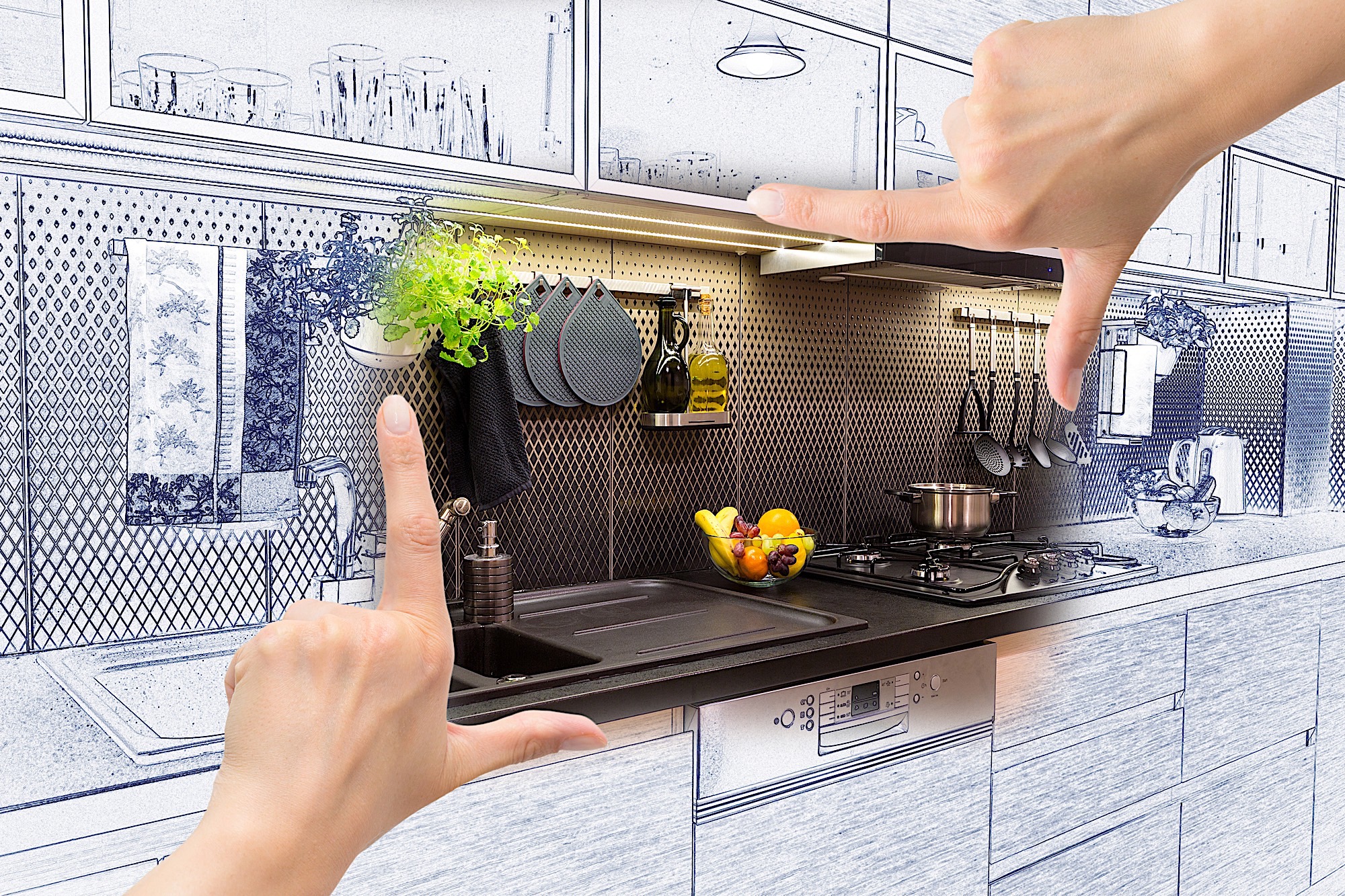 Female hands framing custom kitchen design. Combination drawing and photo.